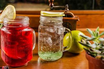 Refreshing Drink Red Green Apple Licor Lemon Soda Glass Jar Ice On Wooden Table Bakery Restaurant