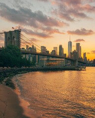 The Brooklyn Bridge and Manhattan skyline at sunset, from Dumbo, Brooklyn, New York