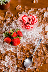 Perfect Strawberry Ice Cream on a Wooden Tablet Covered of Ice Cubes Refreshing Food Dessert
