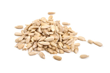 Pile of peeled sunflower seeds, isolated on white background. High resolution image.