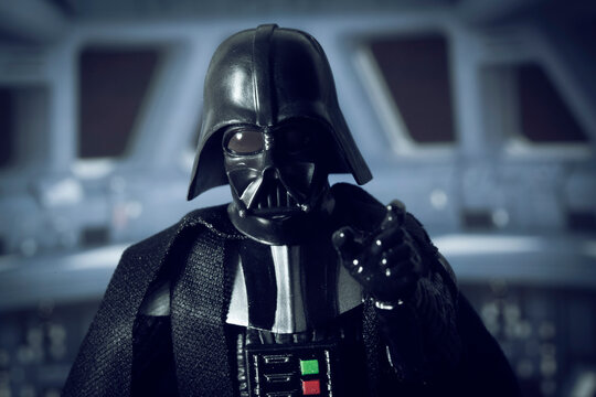 NEW YORK USA, JULY 7 2019: Star Wars Sith Lord Darth Vader in the Death Star looks to camera, force choke hold - Hasbro action figure