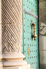 Beautiful door with carved stone pillars of the town hall of Alicante