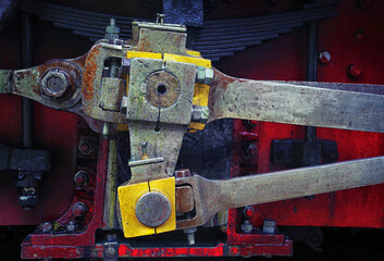 Retro steam Mocanita locomotive abstract details. Locomotive of the 19th early 20th century with a steam engine. Metal cast iron parts. Levers, engines, fences, boilers, pipes of the train