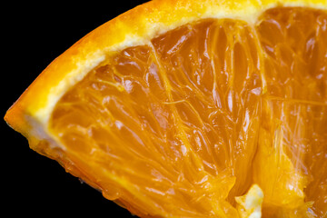 Close-up of an orange peel with pulp.