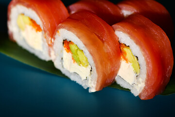 Delicious tuna sushi maki. Asian food, Japanese makizushi, roll, delivery concept. Tasty and colorful image of seafood restaurant menu.
