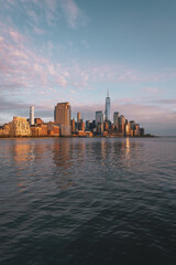Obraz premium New York City skyline and Hudson River at sunset, Financial District, Manhattan, New York