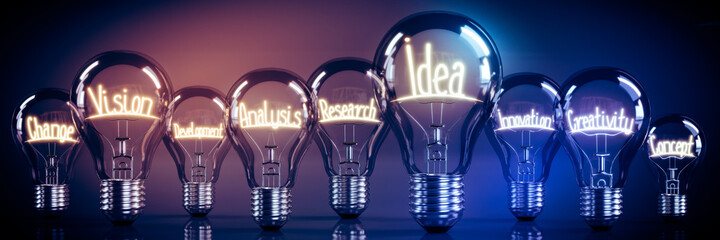 Idea, vision, creativity concept - shining light bulbs - 3D illustration