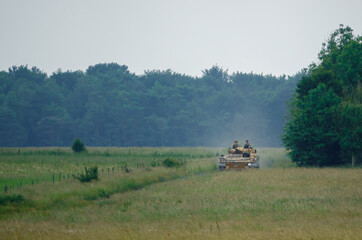 Fototapeta premium army infantry fighting vehicle on maneuvers Wiltshire, UK