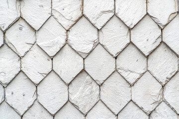 Old white wood tiles on a house