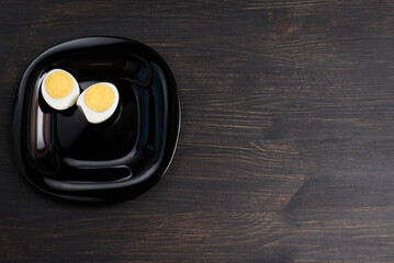 eggs on black wood