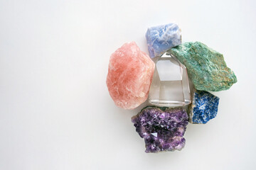 Crystals and gemstones on a white background with blank space