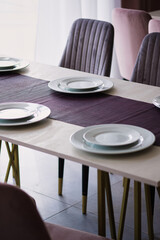 Table setting in the restaurant. Preparing the restaurant for the opening.
