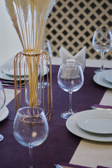 Table setting in the restaurant. Preparing the restaurant for receiving guests.