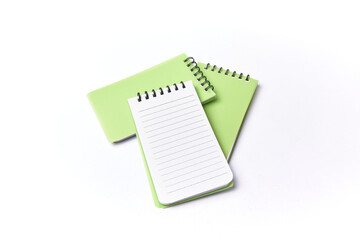 Small notebook used to remember personal information, note papers isolated on white