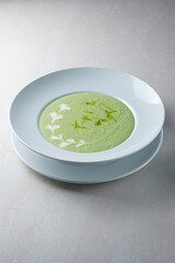 Menu for the restaurant: broccoli cream soup, seasoned with olive oil and cream.