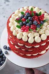 Sponge cake red velvet. Cake with cream cheese cream and raspberry filling.