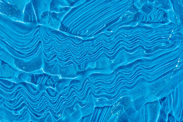 Transparent beauty cosmetic serum sample swatch. Hand sanitizer gel texture smear smudge with bubble. Blue moisturizing cleanser hair gel. Skincare makeup cream. Skin care liquid product