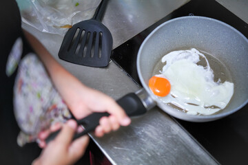 frying pan with eggs