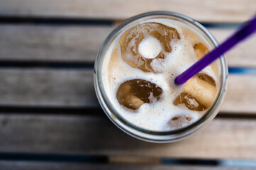 Cold coffee drink, cooling frappe beverage with ice in hot summer weather, refreshment concept