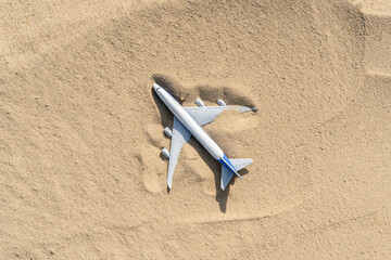 abandoned airplane in desert under sand, wild no people destination - Powered by Adobe