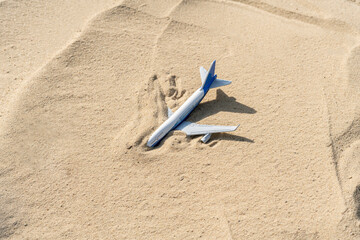 abandoned airplane in desert under sand, wild no people destination