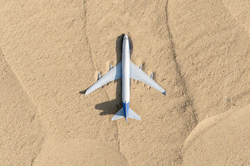 abandoned airplane in desert under sand, wild no people destination