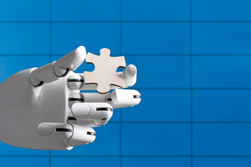 robotic machine arm hand holding jigsaw puzzle, solving problem concept