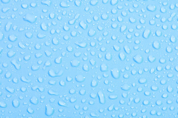 Water Drops On Blue Background.