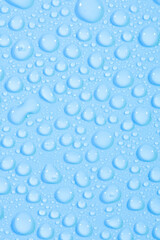 Water Drops On Blue Background.
