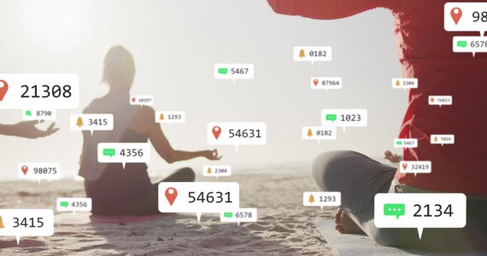 Animation of social media notifications, over women doing yoga sitting on beach