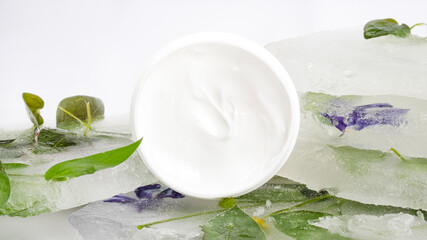Fototapeta na wymiar cosmetic cream with frosty ice freshness