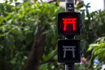 Pedestrian traffic light stylized with oriental themes in Liberdade neighborhood, Japanese and other Asian immigrants reside, Sao Paulo, Brazil