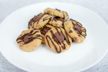 Thumbprint cookies with chocolate, selective focus