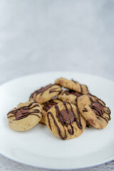 Thumbprint cookies with chocolate, selective focus
