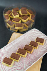 Malaysian Kuih Raya called Royal Chocolate Tart. Popular kuih raya on Hari Raya Aidilfitri in Malaysia. Selective focus.