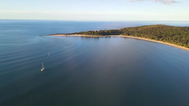 Boats Sailing At South Pacific Ocean Near Trial Bay Gaol Beach - Laggers Point Headland In Arakoon, South West Rocks In Kempsey Shire, New South Wales, Australia. - aerial