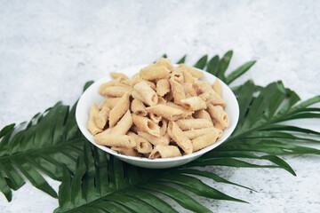 Malaysian Kuih Raya called Crunchy Popia Nestum. Popular kuih raya on Hari Raya Aidilfitri in Malaysia. Selective focus.