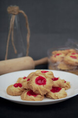 Malaysian Kuih Raya called Strawberry Butter Cookies. Popular kuih raya on Hari Raya Aidilfitri in Malaysia. Selective focus.