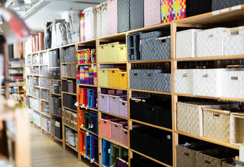 Hardware store shelves filled with boxes for linen
