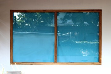 window with a frame with sky blue shade