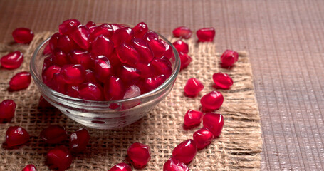 Fresh Pomegranate, rich in natural antioxidants. Concept of red fruits, vitamins and natural antioxidants to the skin for beauty.