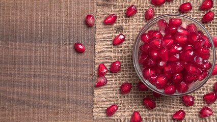 Fresh Pomegranate, rich in natural antioxidants. Concept of red fruits, vitamins and natural antioxidants to the skin for beauty.