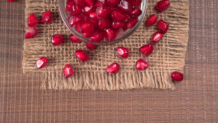 Fresh Pomegranate, rich in natural antioxidants. Concept of red fruits, vitamins and natural antioxidants to the skin for beauty.