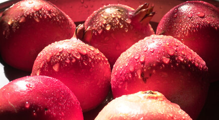 Fresh Pomegranate, rich in natural antioxidants. Concept of red fruits, vitamins and natural antioxidants to the skin for beauty.