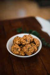soft oatmeal cookies on a wooden table