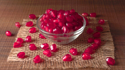 Fresh Pomegranate, rich in natural antioxidants. Concept of red fruits, vitamins and natural antioxidants to the skin for beauty.