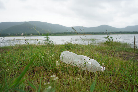 Plastic bottle waste thrown into moutain. Plastic pollution