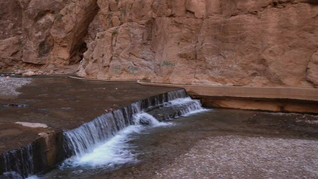 Running Water At The Limestone River Canyon With Rugged Landscape. wide shot