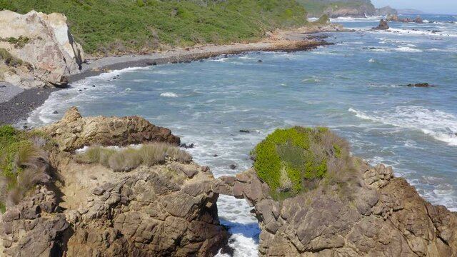 a rare rock form like a mamut next to the beach sector located in the Pacific Ocean