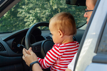 Baby boy driver. Travel with kids concept.